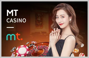 Vận động viên tennis đang giao bóng trên sân đất nện
